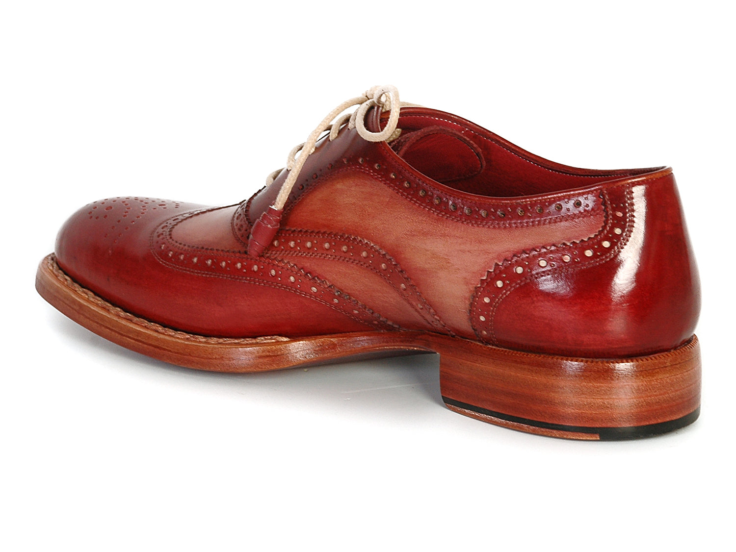 Paul Parkman Men's Wingtip Oxfords in Bordeaux and Camel, showcasing hand-painted leather upper and elegant design.