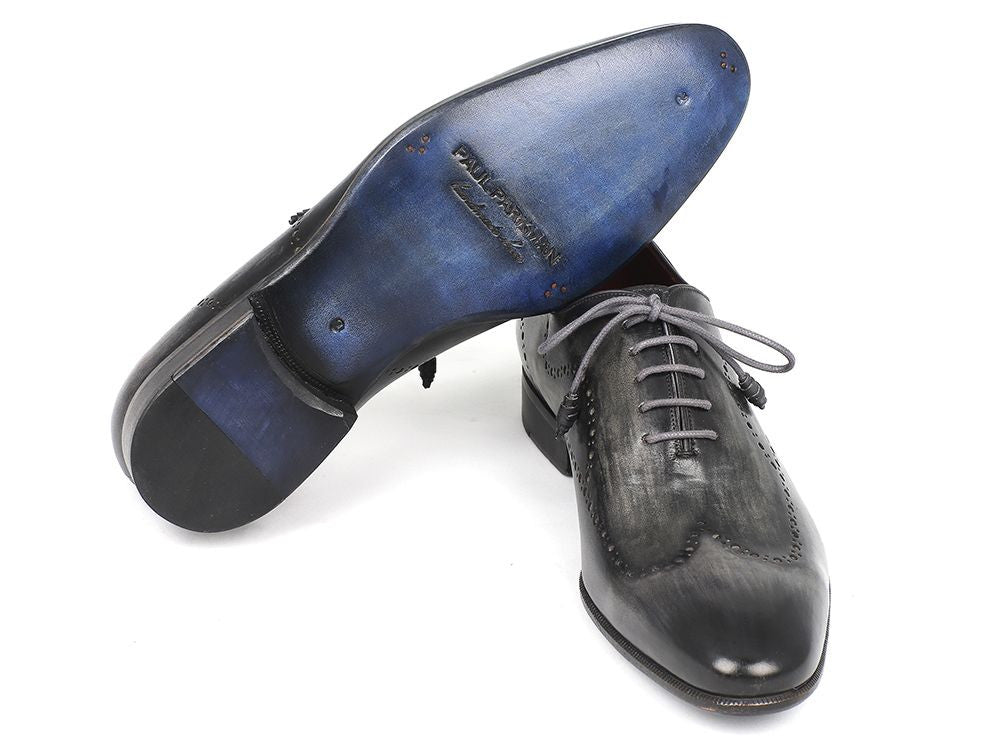 Paul Parkman Wingtip Oxfords in gray and black handpainted calfskin with wingtip perforations and blue painted leather sole.