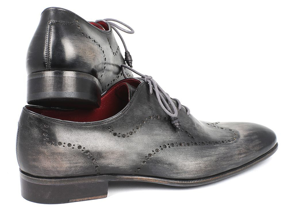 Paul Parkman Wingtip Oxfords in gray and black handpainted calfskin with wingtip perforations and blue painted leather sole.