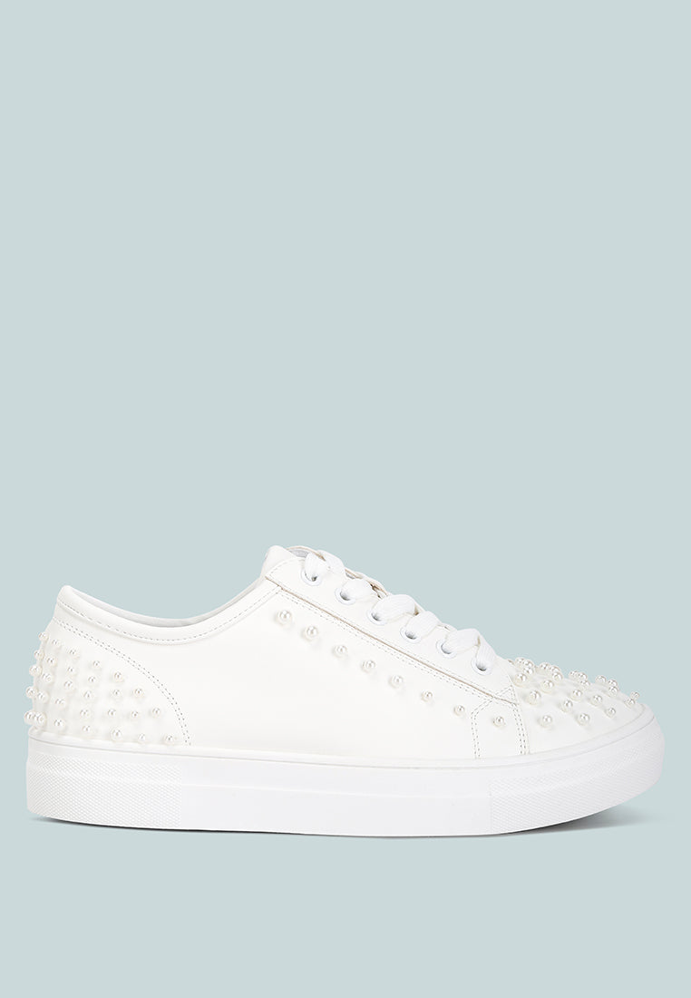 Stylish Pearly Sneakers with pearl embellishments and flatform heels, perfect for casual and dressy occasions.