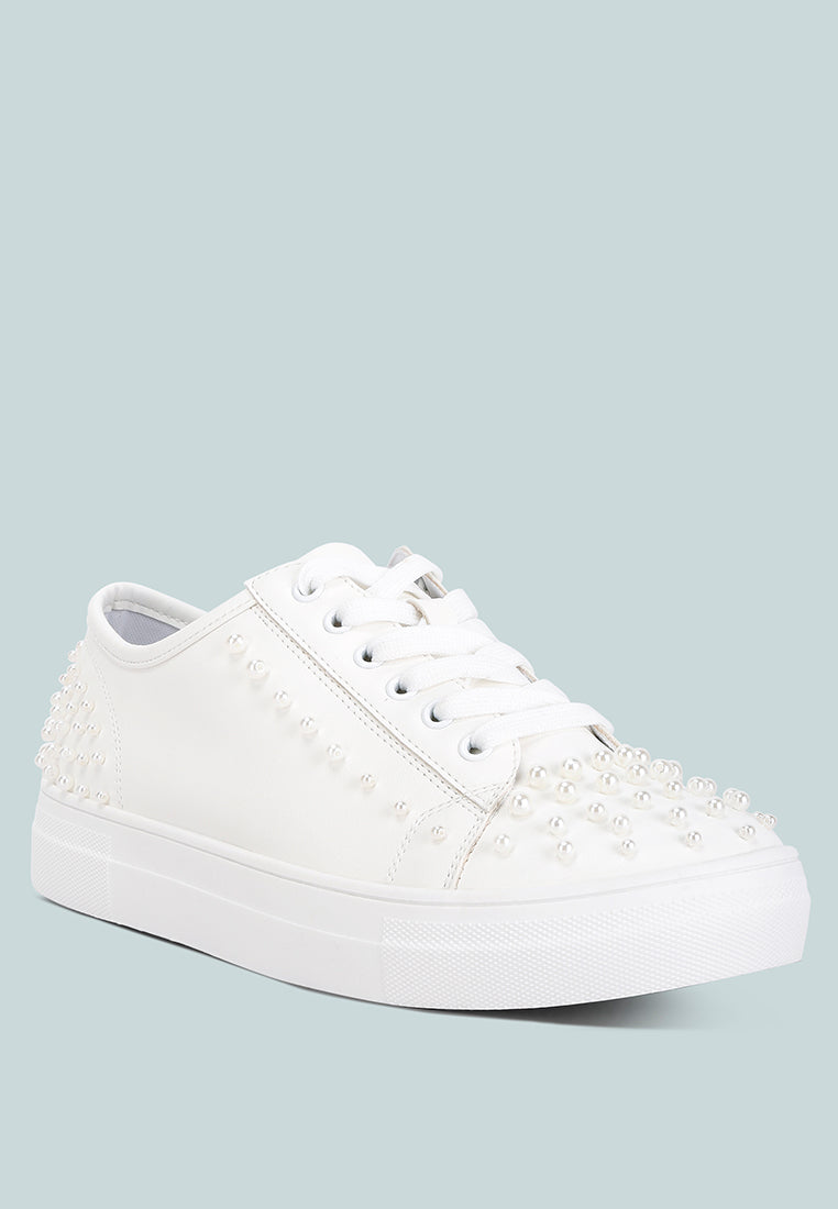 Stylish Pearly Sneakers with pearl embellishments and flatform heels, perfect for casual and dressy occasions.