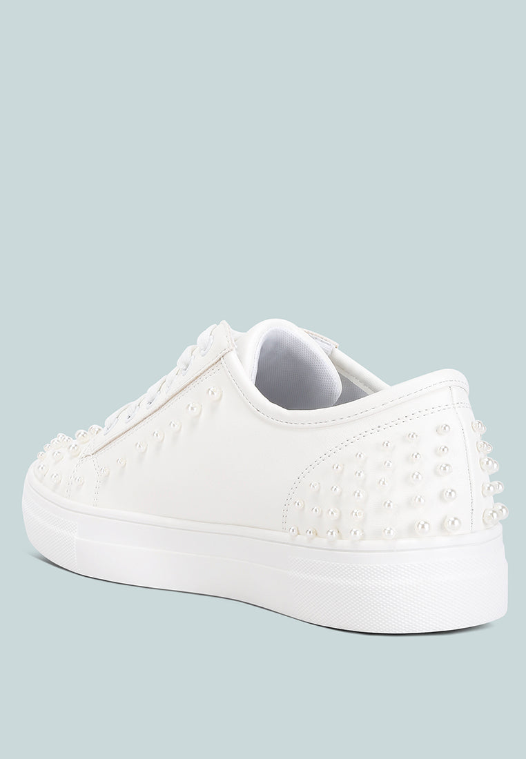 Stylish Pearly Sneakers with pearl embellishments and flatform heels, perfect for casual and dressy occasions.