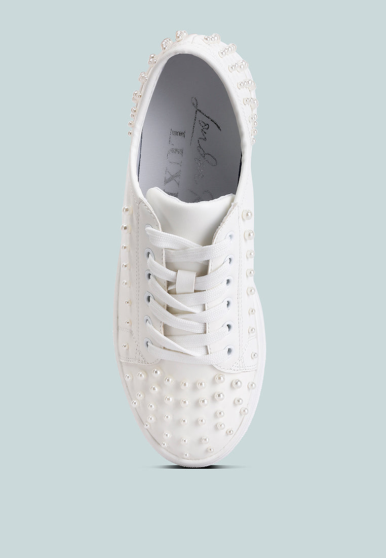 Stylish Pearly Sneakers with pearl embellishments and flatform heels, perfect for casual and dressy occasions.