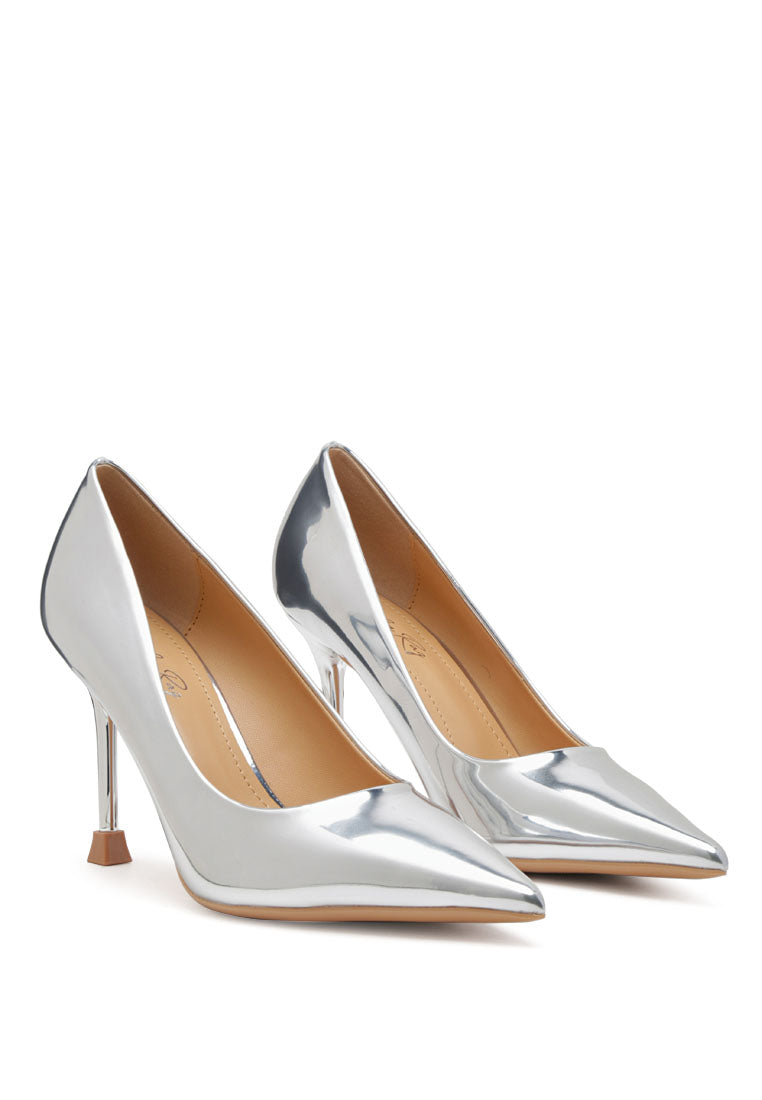 Poudre Metallic Patent Faux Leather Pumps showcasing a sleek metallic finish, high heel stilettos, and pointed toe design, perfect for elegant occasions.