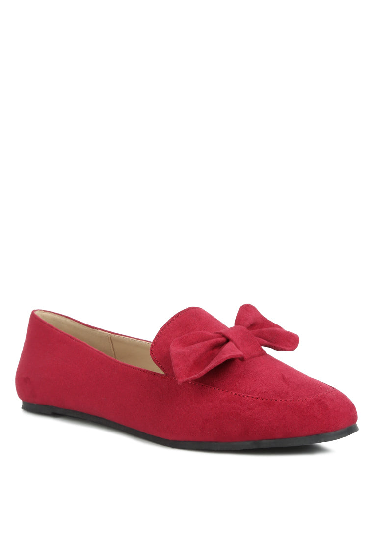 Stylish Remee Front Bow Loafers featuring a chic bow design, flat heel, and round toe, perfect for casual and formal wear.