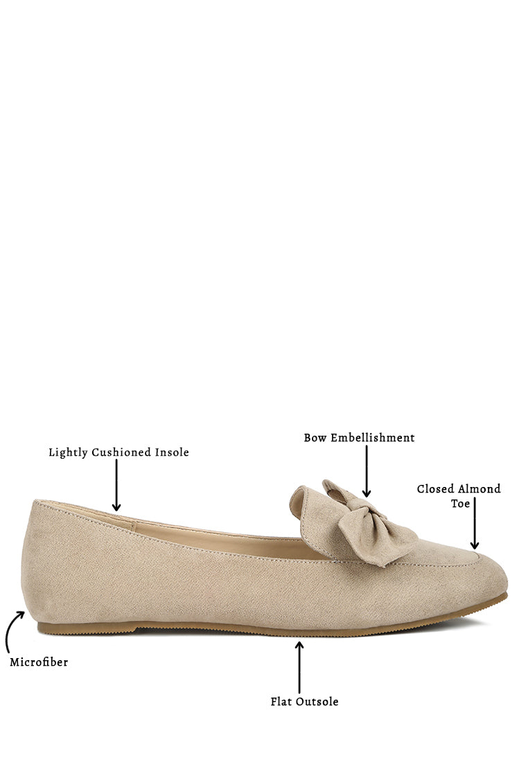 Stylish Remee Front Bow Loafers featuring a chic bow design, flat heel, and round toe, perfect for casual and formal wear.