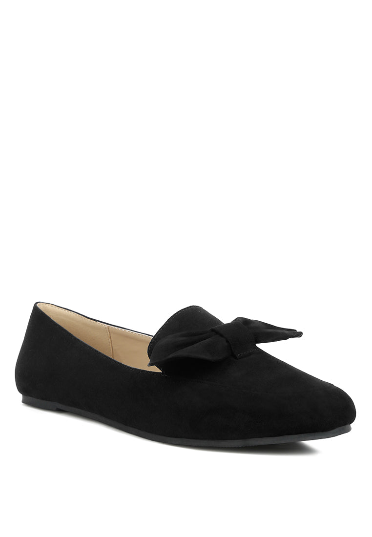 Stylish Remee Front Bow Loafers featuring a chic bow design, flat heel, and round toe, perfect for casual and formal wear.