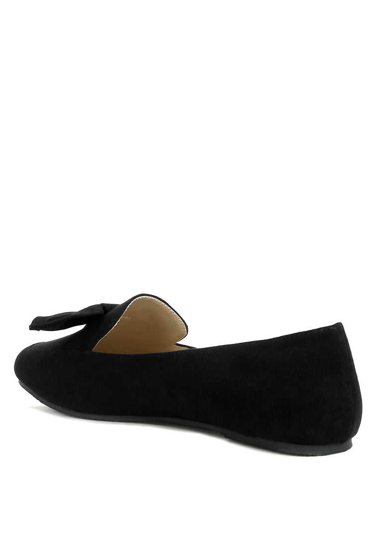 Stylish Remee Front Bow Loafers featuring a chic bow design, flat heel, and round toe, perfect for casual and formal wear.