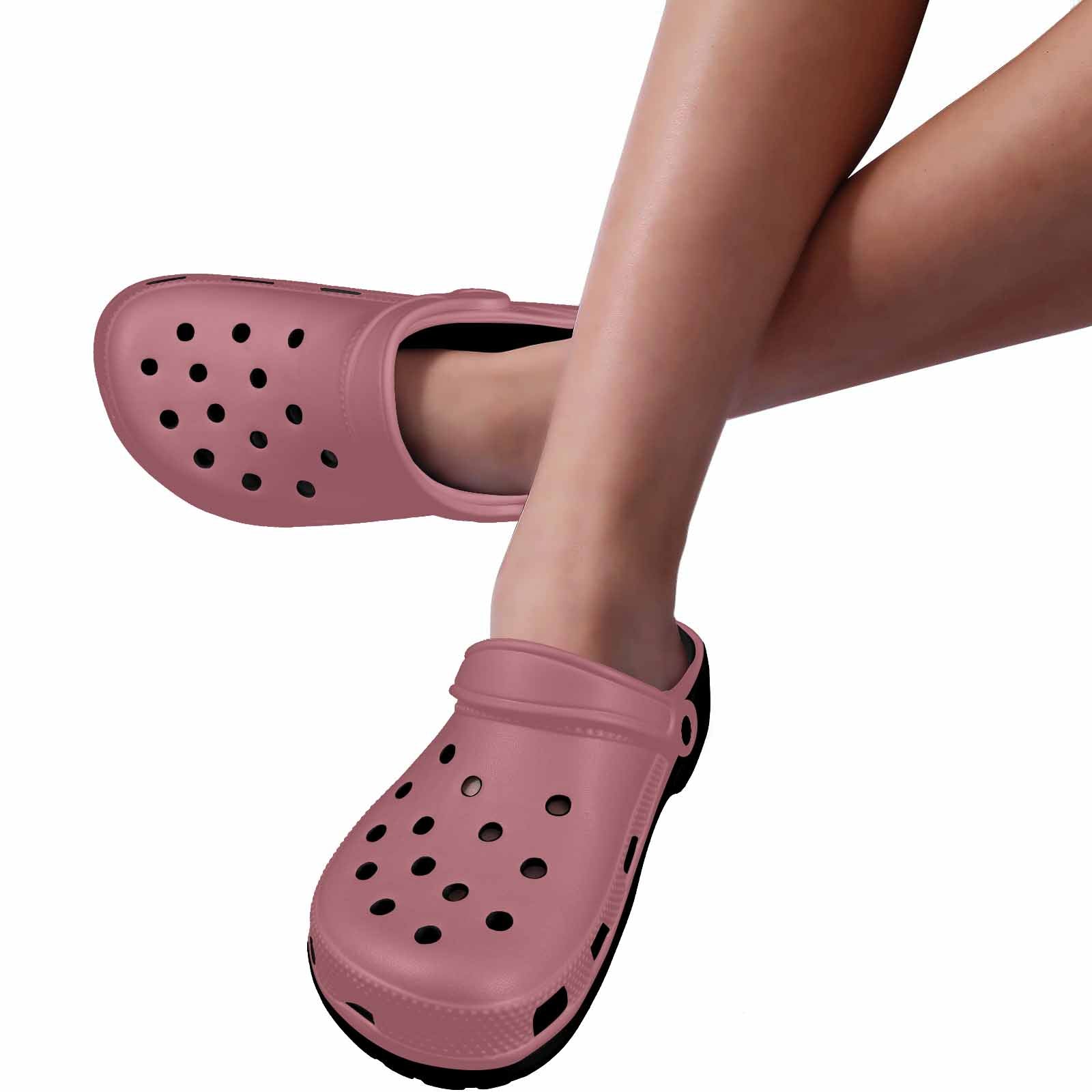 Stylish Rose Gold Red Adult Clogs with ventilation ports and pivoting heel straps, perfect for various occasions.