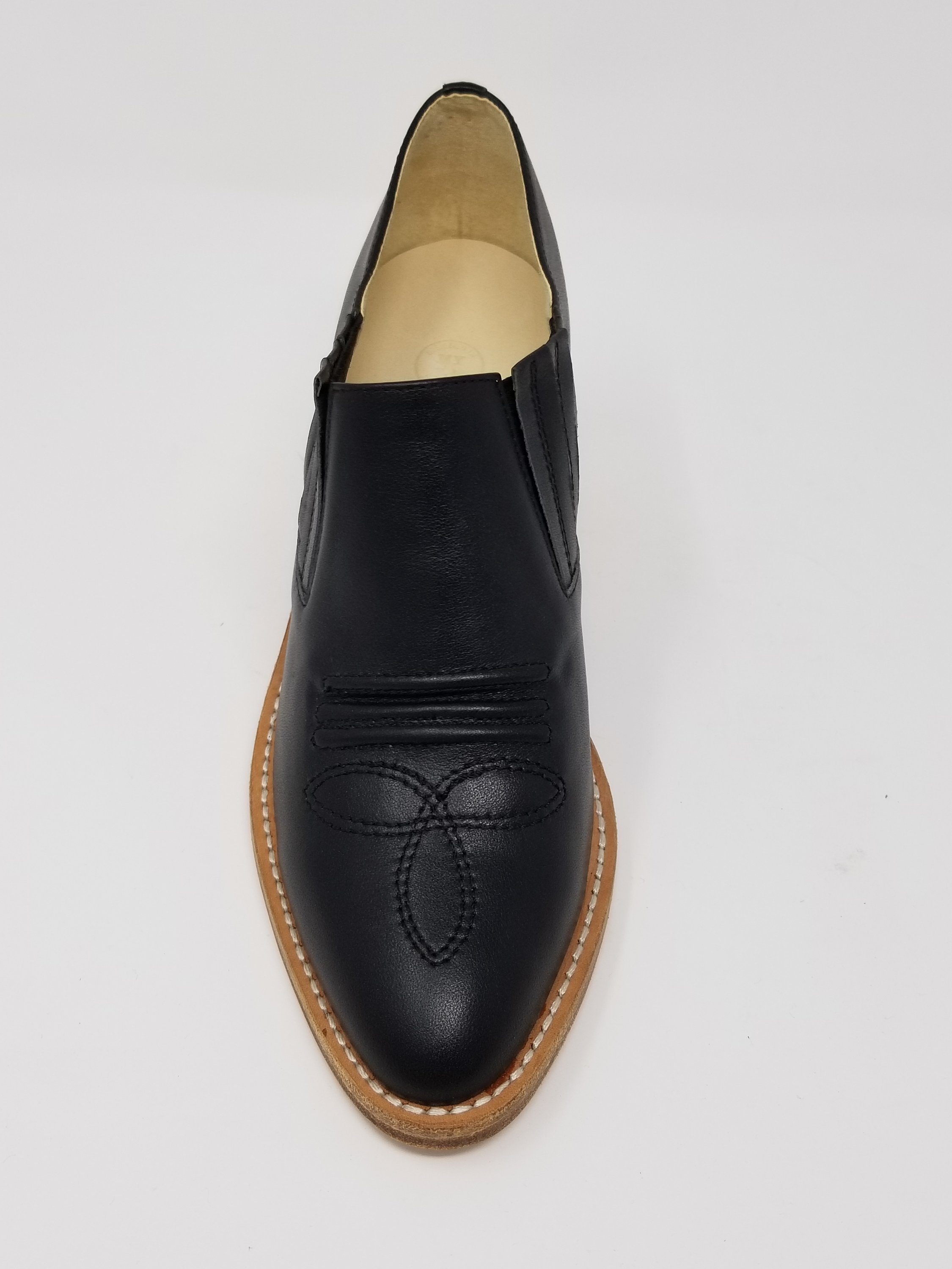 Santa Ana shoes featuring full leather upper, memory foam insole, and natural wood heel, crafted in Los Angeles.