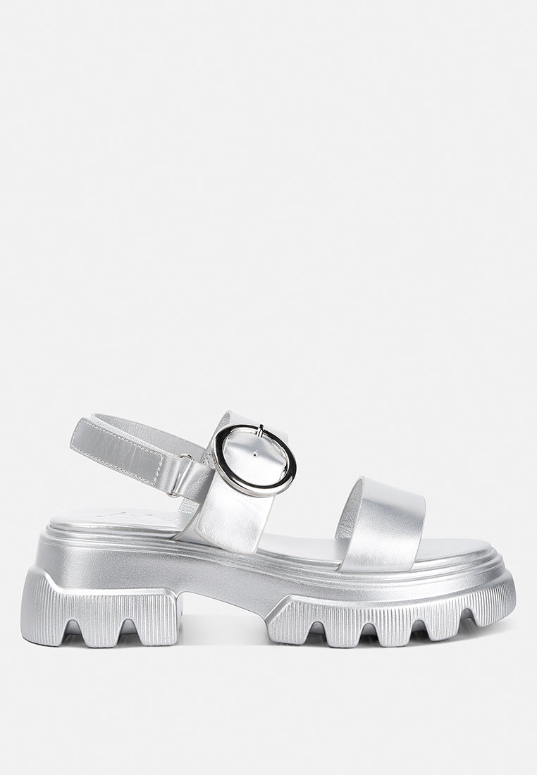 Silas Metallic Chunky Sandals featuring a rugged lug sole and glamorous metallic finish, designed for comfort and style.