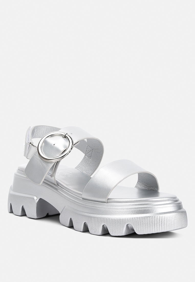 Silas Metallic Chunky Sandals featuring a rugged lug sole and glamorous metallic finish, designed for comfort and style.