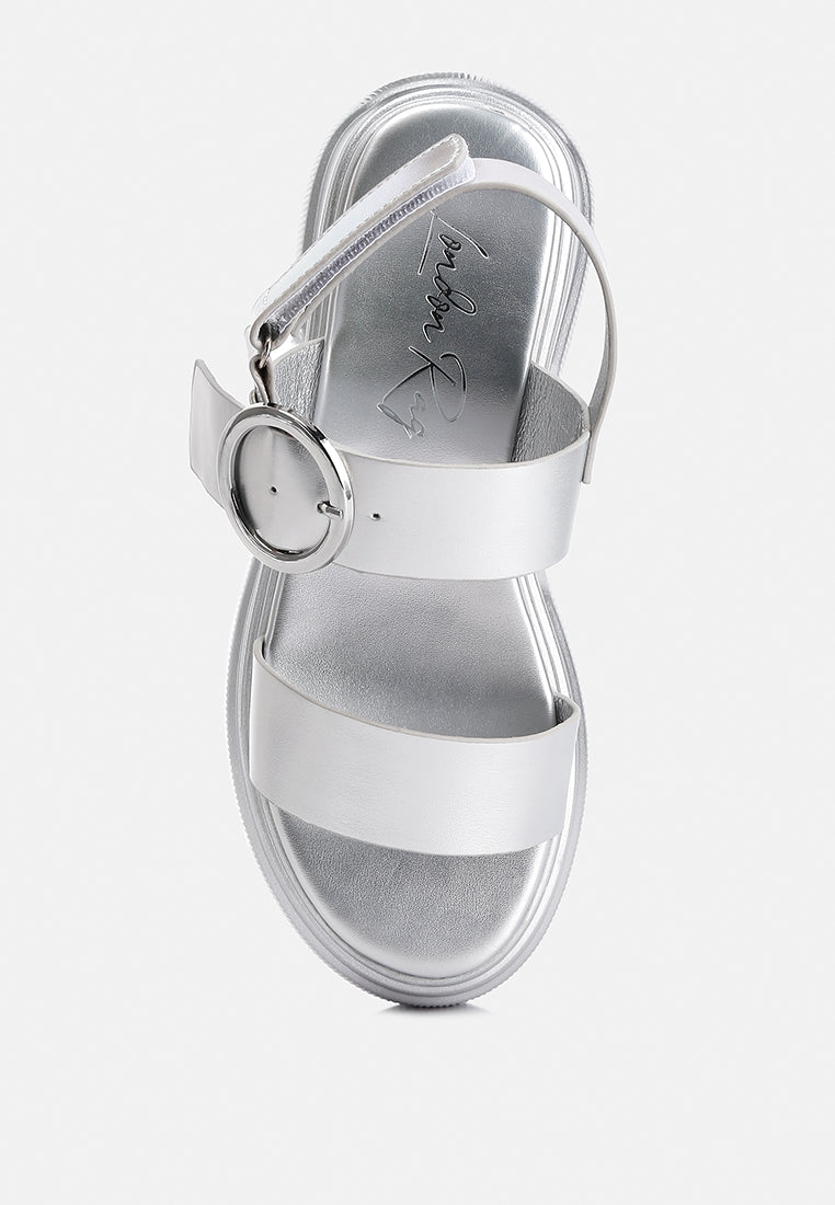 Silas Metallic Chunky Sandals featuring a rugged lug sole and glamorous metallic finish, designed for comfort and style.