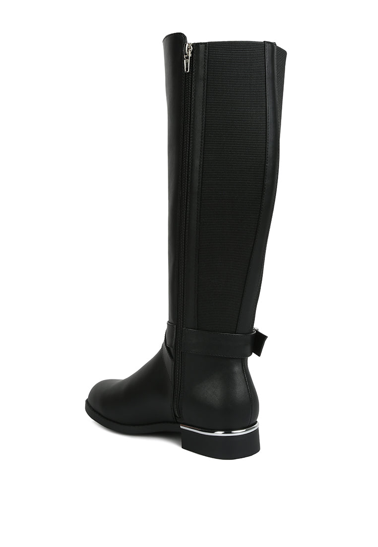 Stylish Snowd Riding Boot featuring dual tones, metallic buckle belt embellishment, and knee-high design.