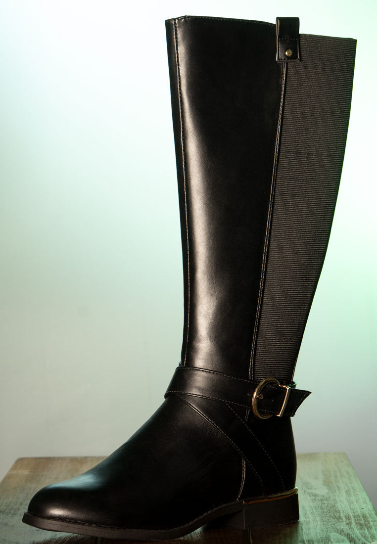 Stylish Snowd Riding Boot featuring dual tones, metallic buckle belt embellishment, and knee-high design.