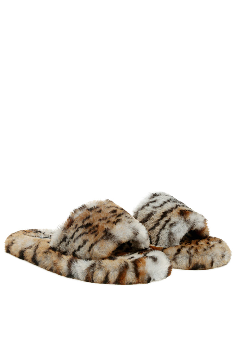 Snuggle-In Indoor Fur Flats showcasing soft faux fur material and open toe design, perfect for cozy indoor wear.