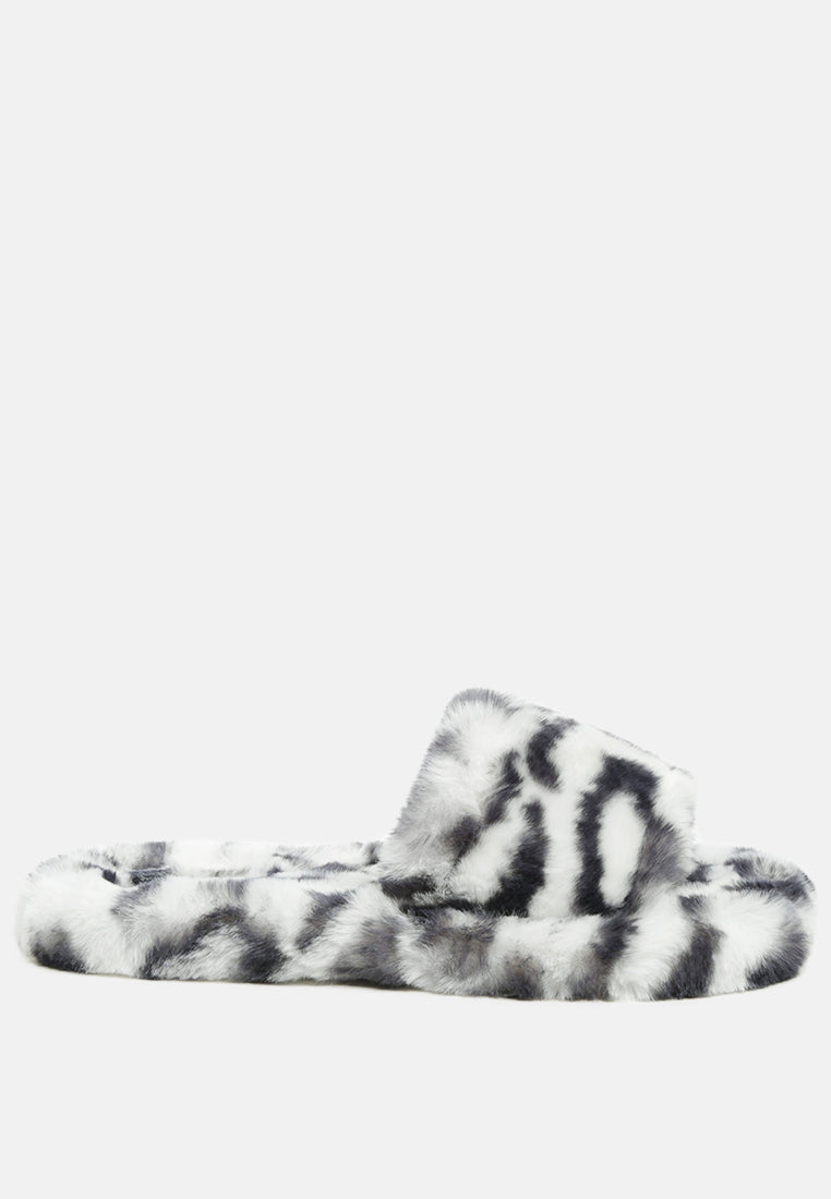 Snuggle-In Indoor Fur Flats showcasing soft faux fur material and open toe design, perfect for cozy indoor wear.