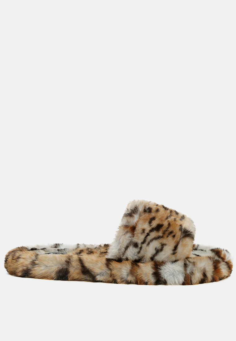 Snuggle-In Indoor Fur Flats showcasing soft faux fur material and open toe design, perfect for cozy indoor wear.