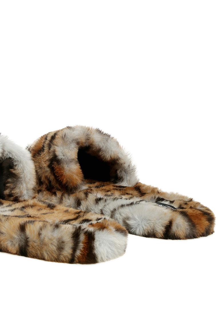 Snuggle-In Indoor Fur Flats showcasing soft faux fur material and open toe design, perfect for cozy indoor wear.