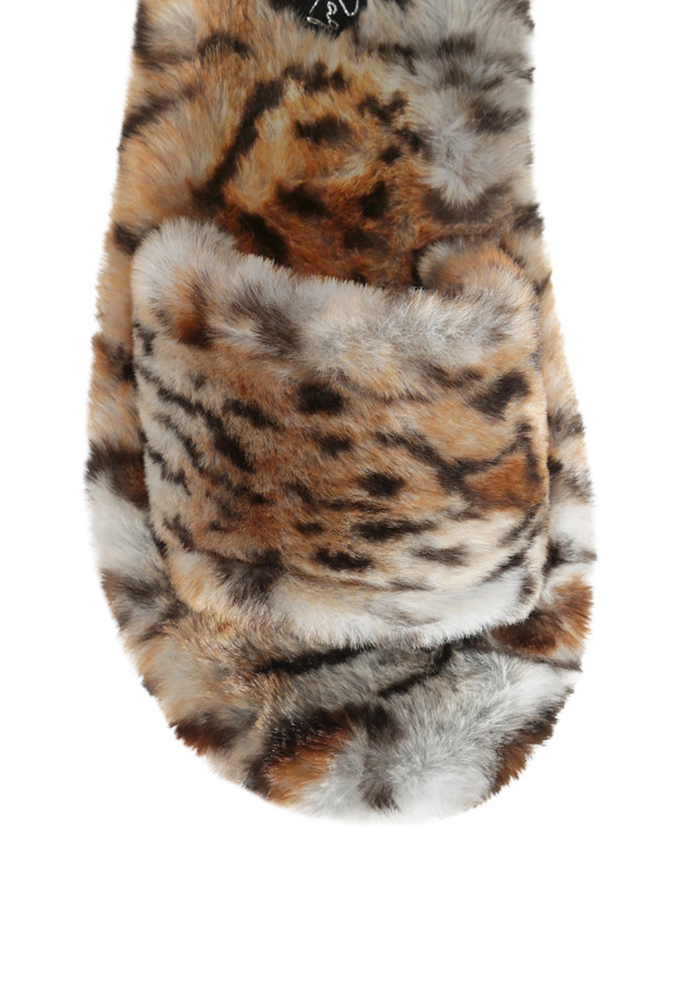 Snuggle-In Indoor Fur Flats showcasing soft faux fur material and open toe design, perfect for cozy indoor wear.