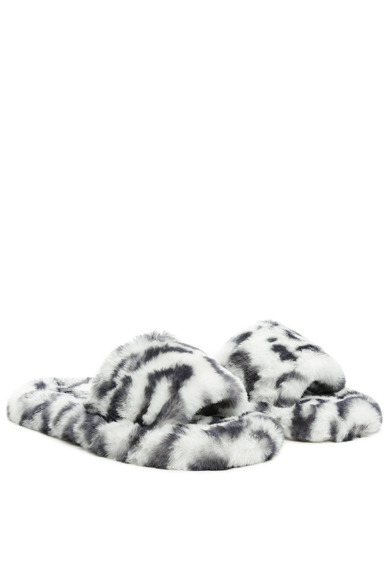 Snuggle-In Indoor Fur Flats showcasing soft faux fur material and open toe design, perfect for cozy indoor wear.