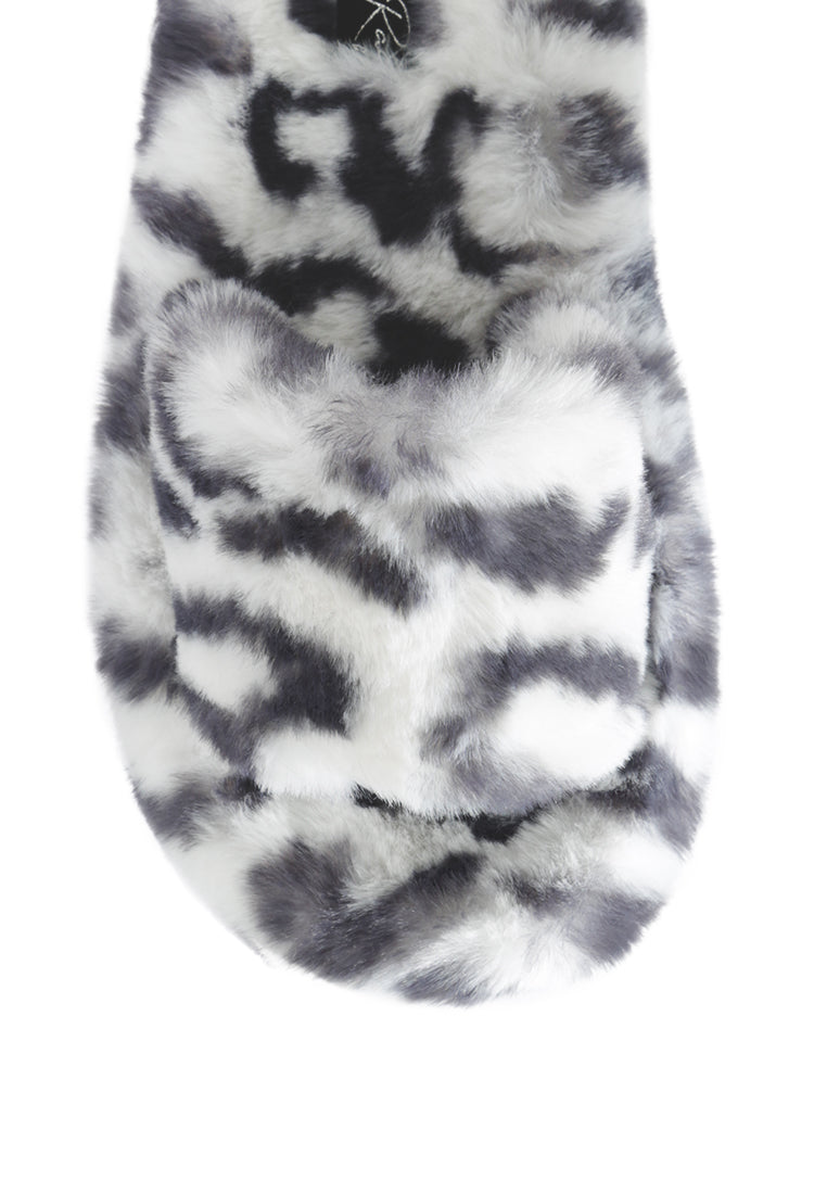 Snuggle-In Indoor Fur Flats showcasing soft faux fur material and open toe design, perfect for cozy indoor wear.