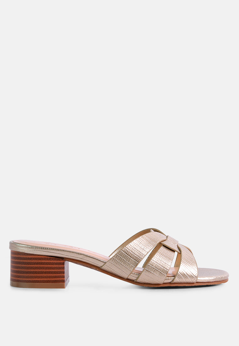 Sonnet Sandal featuring woven straps, low heel, and open toe design, perfect for casual summer wear.