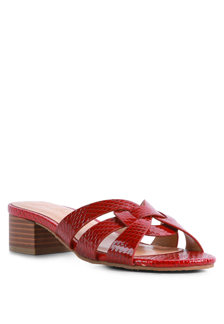 Sonnet Sandal featuring woven straps, low heel, and open toe design, perfect for casual summer wear.