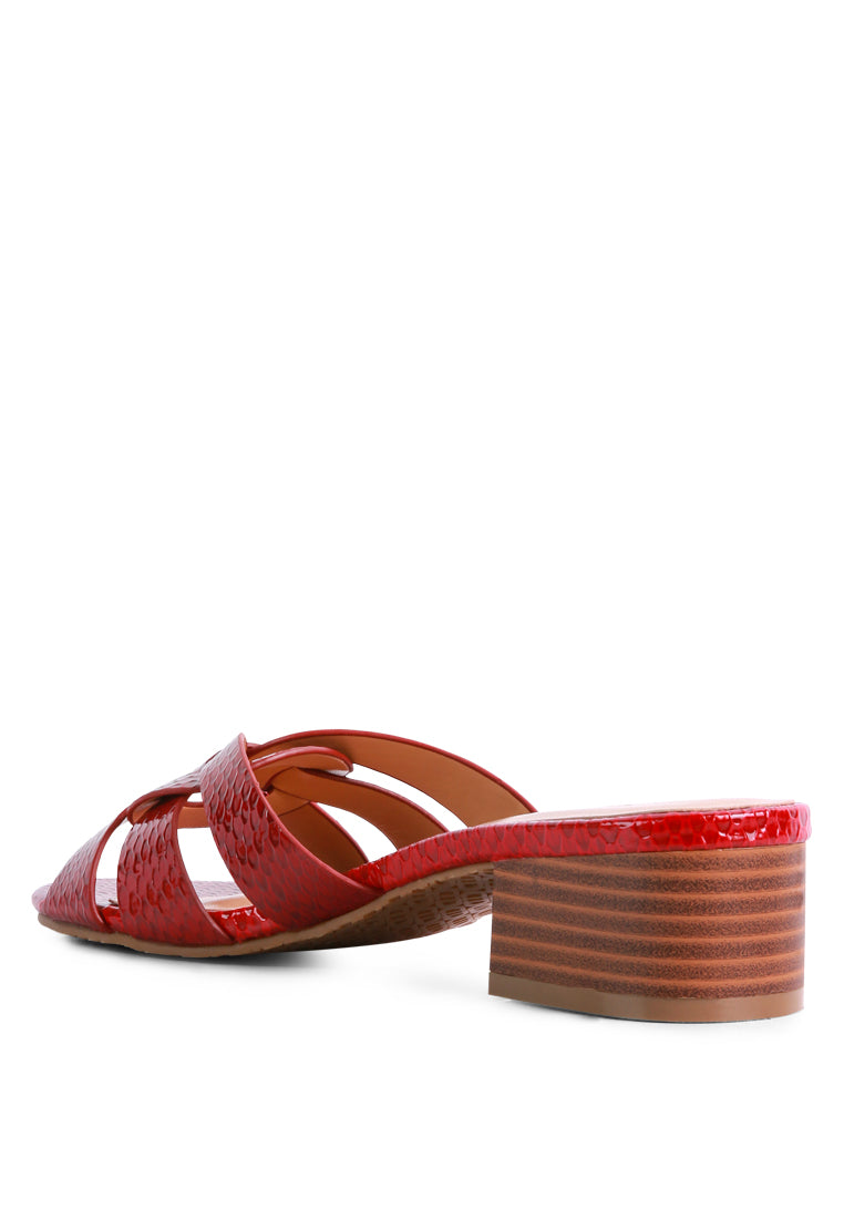 Sonnet Sandal featuring woven straps, low heel, and open toe design, perfect for casual summer wear.