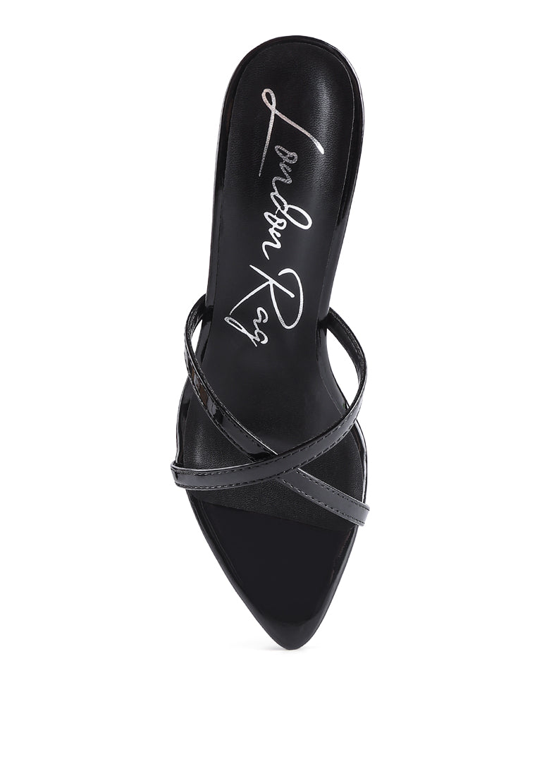 Spellbound High Heel Pointed Toe Sandals featuring a pointed toe and thin cross straps, elegantly designed for stylish comfort.