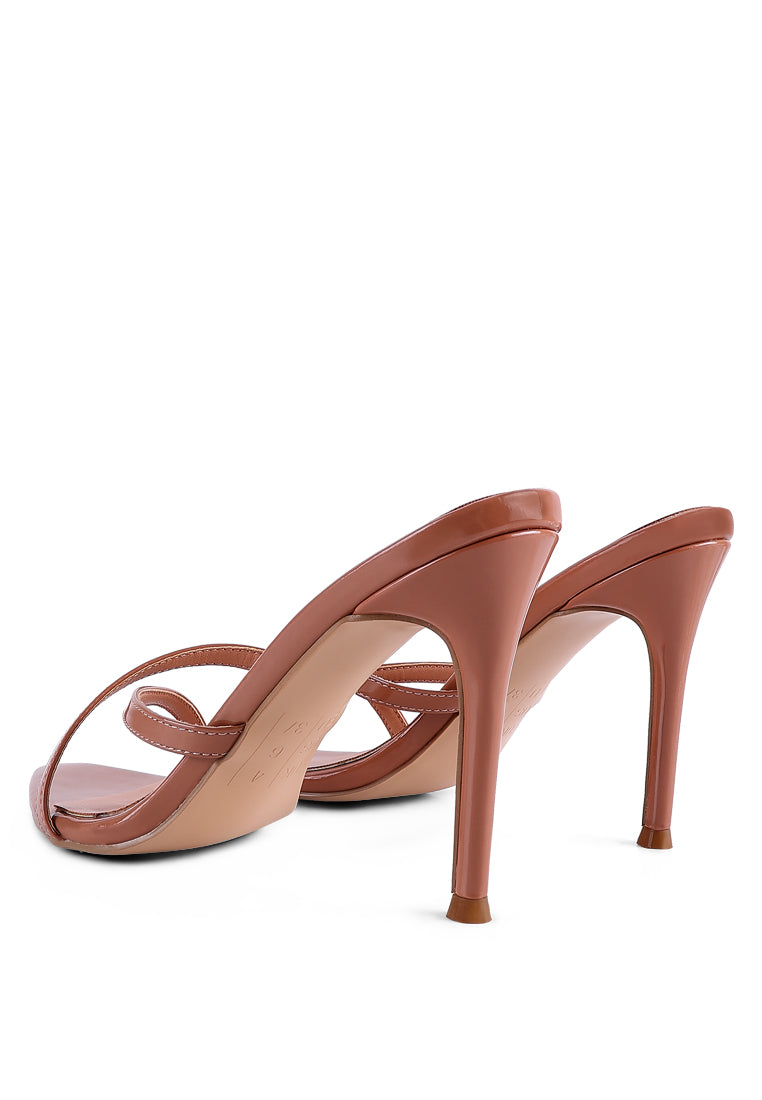 Spellbound High Heel Pointed Toe Sandals featuring a pointed toe and thin cross straps, elegantly designed for stylish comfort.