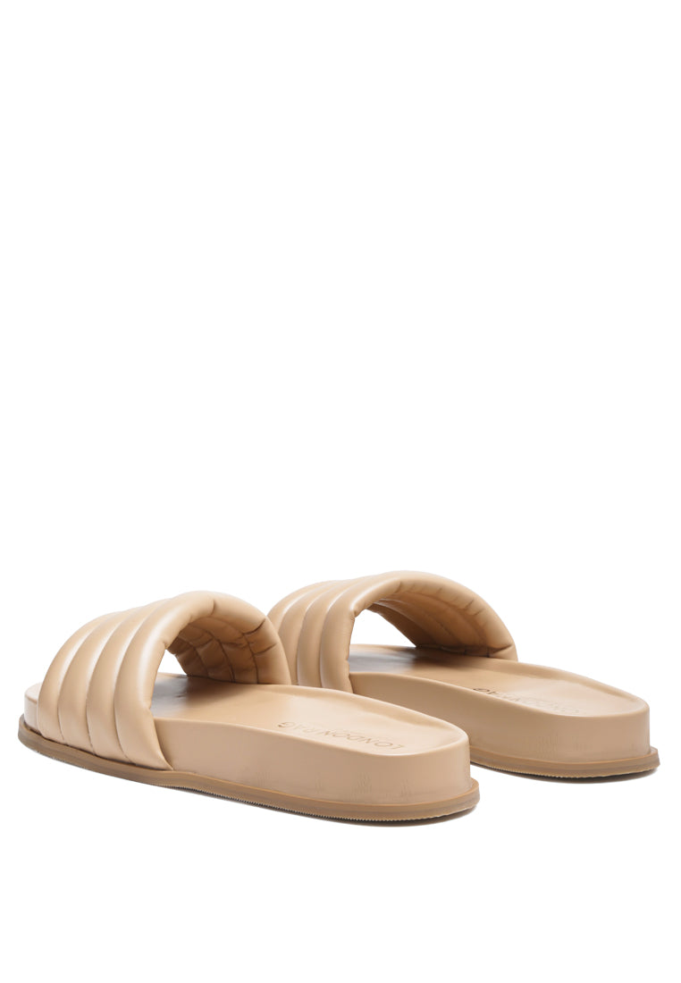 A pair of Sponge Quilted Pool Slides featuring a stylish quilted strap design, perfect for indoor and outdoor wear.