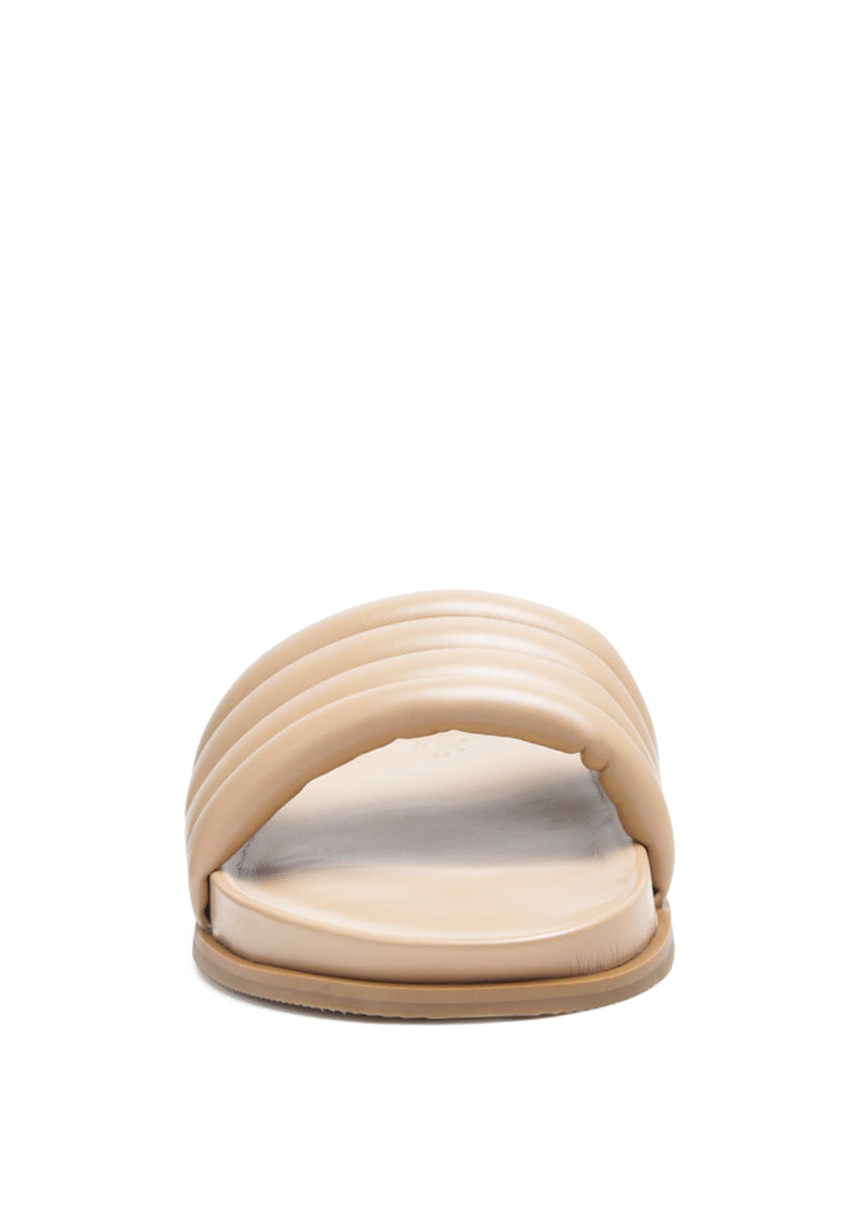 A pair of Sponge Quilted Pool Slides featuring a stylish quilted strap design, perfect for indoor and outdoor wear.