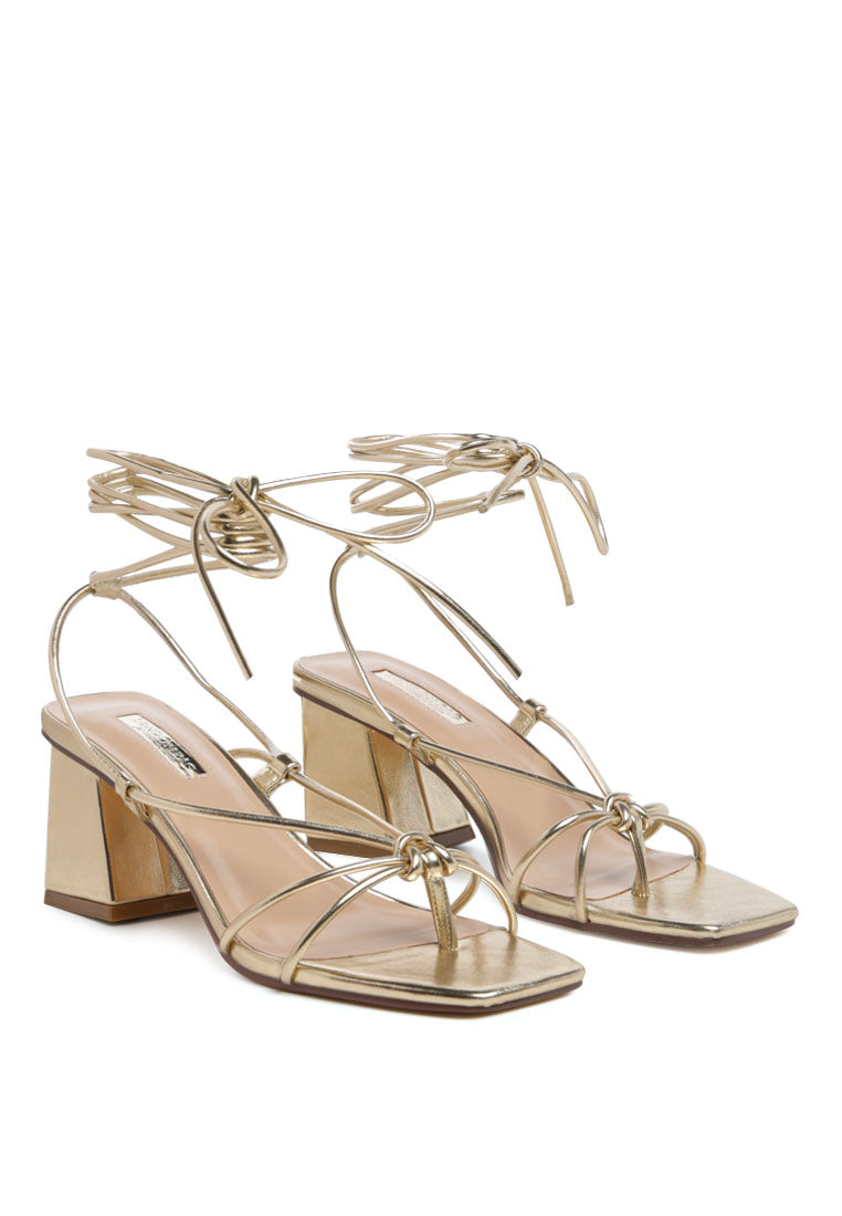 Spruce Dessert Sandal featuring square block heels and tie-up design in vibrant colors, perfect for summer wear.