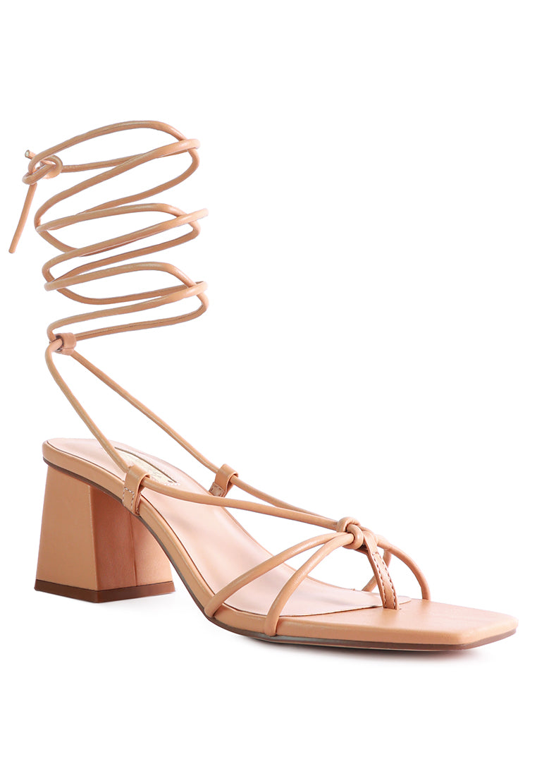 Spruce Dessert Sandal featuring square block heels and tie-up design in vibrant colors, perfect for summer wear.