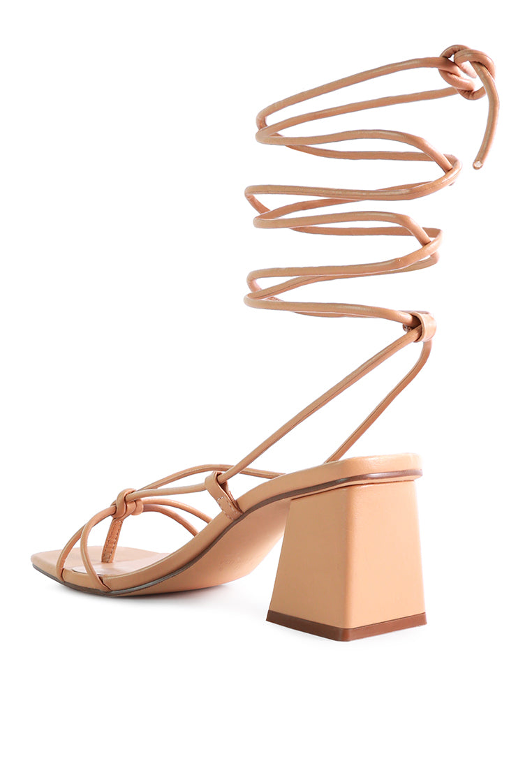 Spruce Dessert Sandal featuring square block heels and tie-up design in vibrant colors, perfect for summer wear.