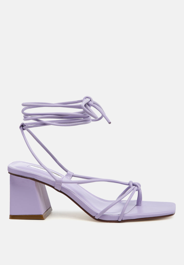 Spruce Dessert Sandal featuring square block heels and tie-up design in vibrant colors, perfect for summer wear.