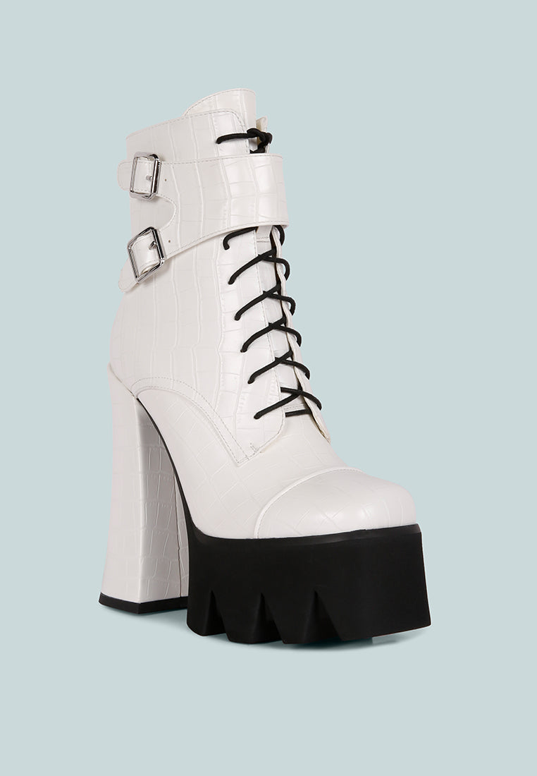 Stylish Stomper Combat Boot featuring chunky platform block heel, lace-up design, and buckle detail.