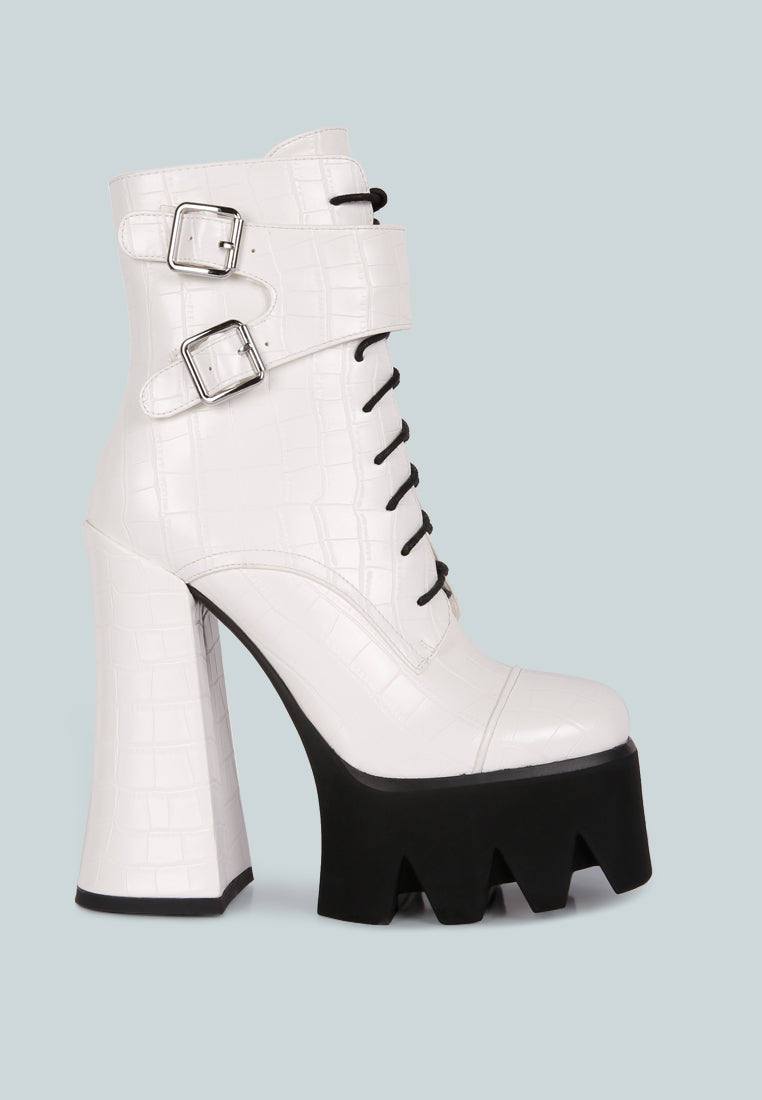 Stylish Stomper Combat Boot featuring chunky platform block heel, lace-up design, and buckle detail.