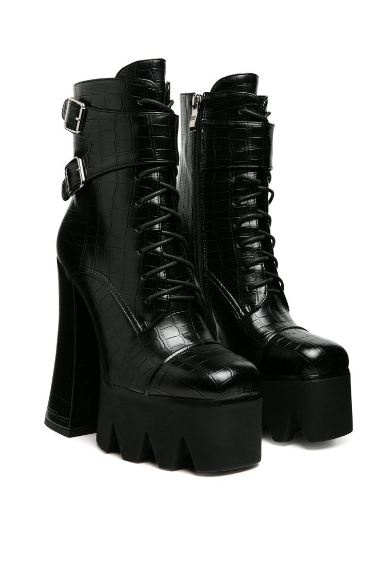 Stylish Stomper Combat Boot featuring chunky platform block heel, lace-up design, and buckle detail.