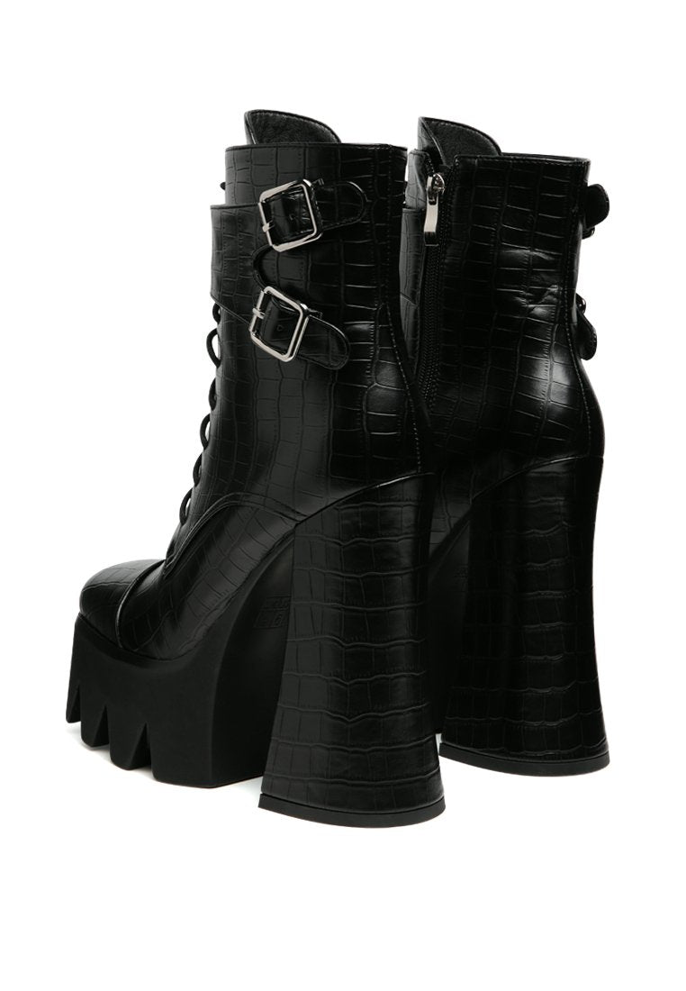 Stylish Stomper Combat Boot featuring chunky platform block heel, lace-up design, and buckle detail.