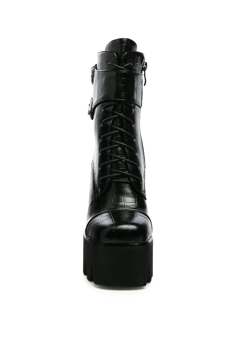 Stylish Stomper Combat Boot featuring chunky platform block heel, lace-up design, and buckle detail.