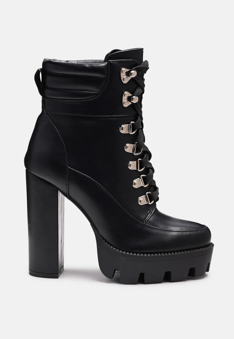 Stylish Stopper Cushion Collared Lace Up Boots with metallic eyelets and high block heel, perfect for parties and casual outings.