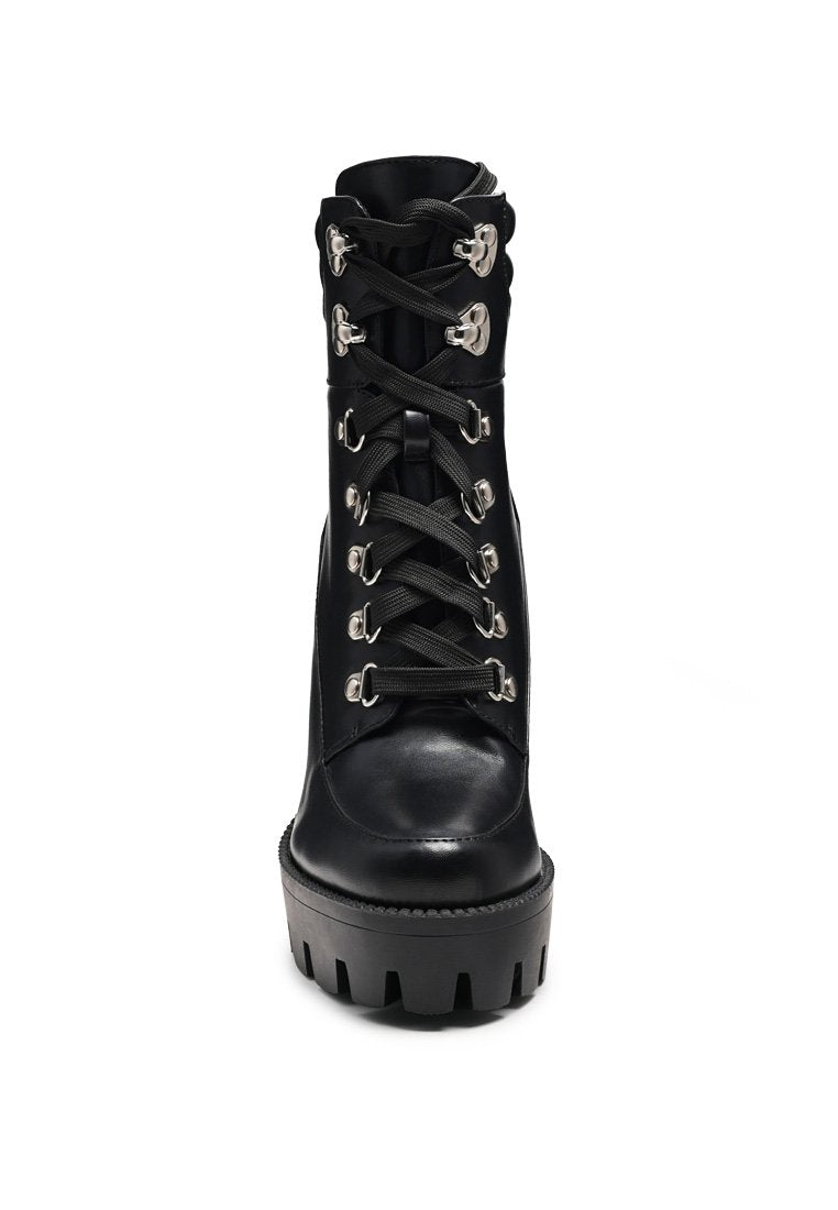 Stylish Stopper Cushion Collared Lace Up Boots with metallic eyelets and high block heel, perfect for parties and casual outings.