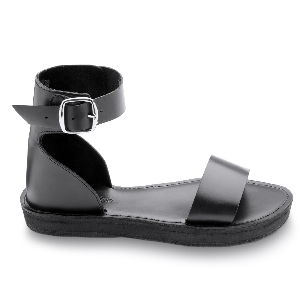 The Camila flatform leather sandals featuring a cushy midsole and handcrafted tire soles, perfect for stylish comfort.