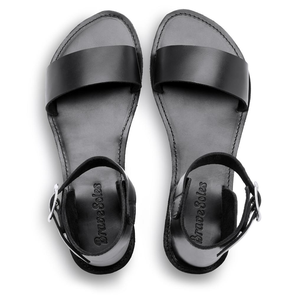 The Camila flatform leather sandals featuring a cushy midsole and handcrafted tire soles, perfect for stylish comfort.