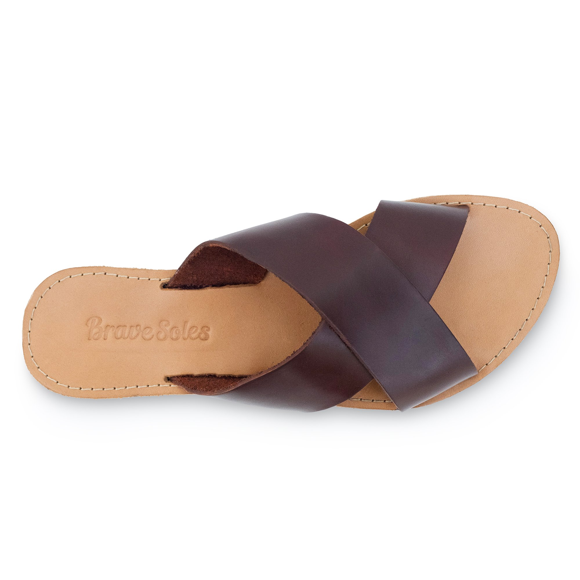 The Constanza genuine leather slides showcasing their stylish design and comfortable fit.