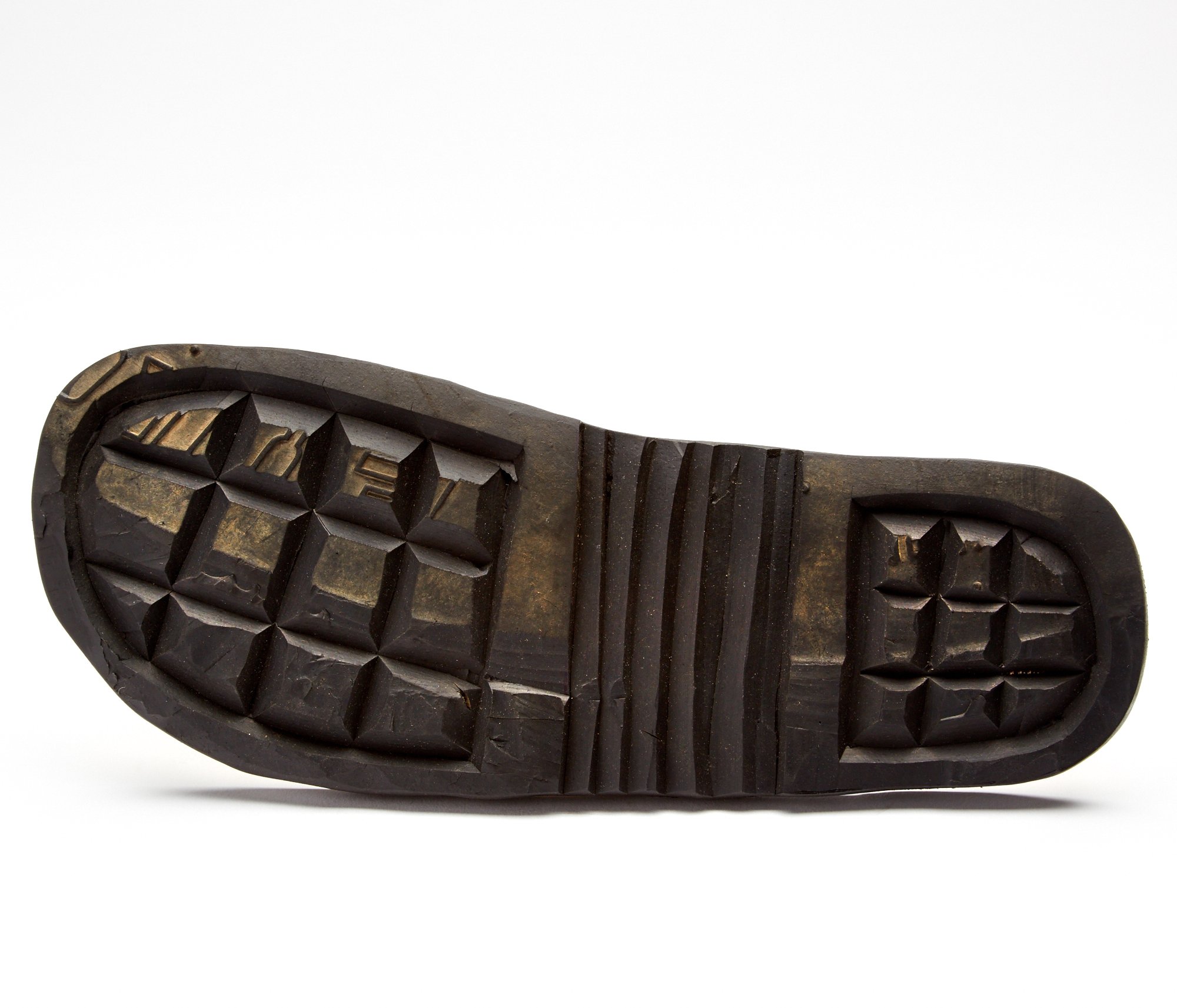 The Novio men's leather flip flops featuring a sleek design with handmade leather footbed and upcycled tire soles.