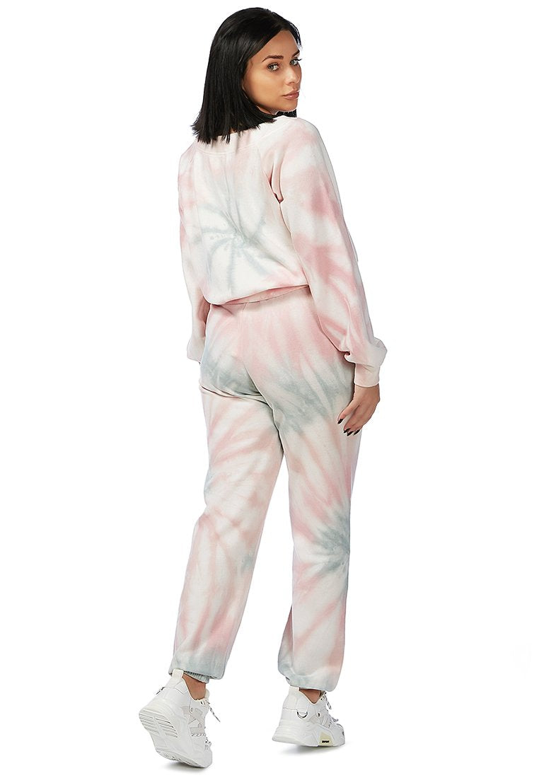 A cozy pastel tie-dye sweat top with full sleeves and a boat neckline, perfect for autumn wear.