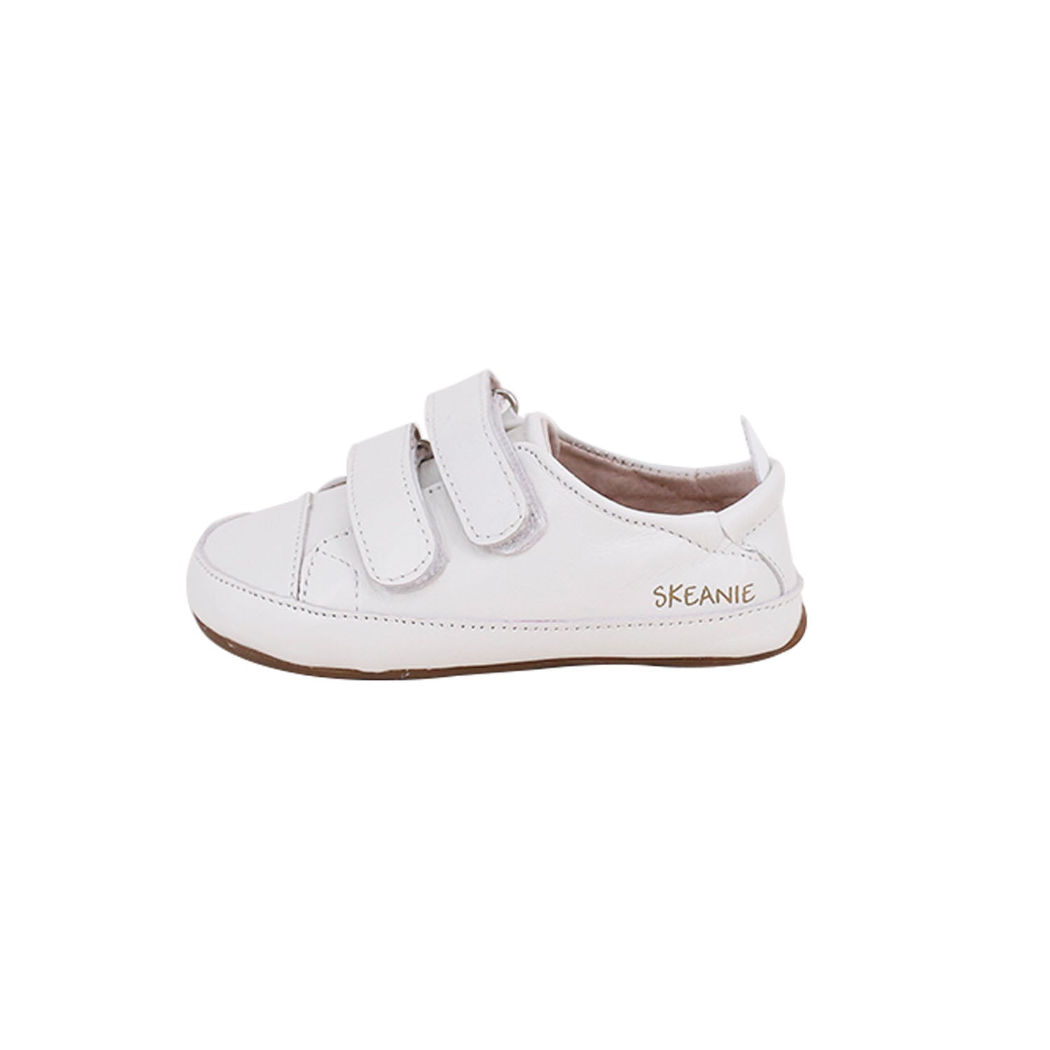 Tyler Trainers First Walker Sneakers in White, made from soft leather with a hook and loop fastener, designed for toddlers.